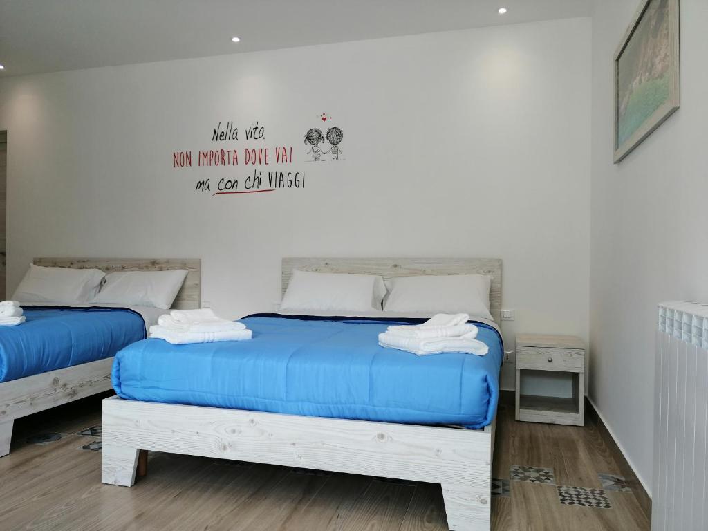 Postel nebo postele na pokoji v ubytování Sicily Rooms Appartamenti