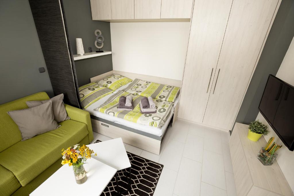 Postel nebo postele na pokoji v ubytování Apartmány Stožec - Stela Premium