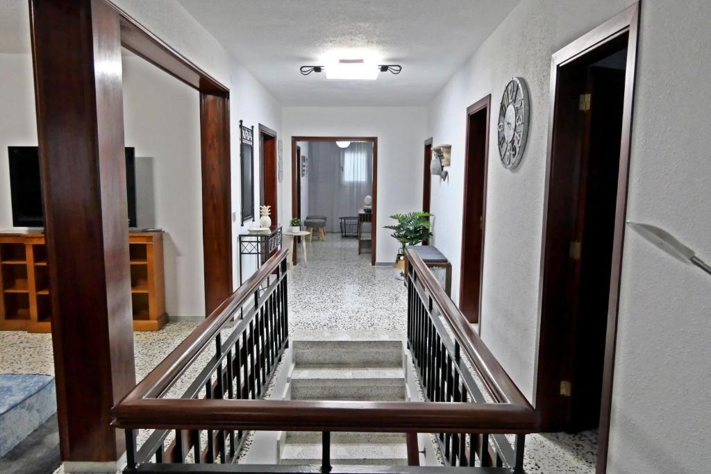 a hallway with stairs leading to a room at VIVIENDA VACACIONAL CRUZ ALTA in Frontera