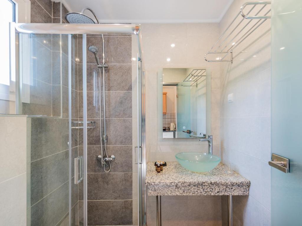 Koupelna v ubytování Callinica Hotel