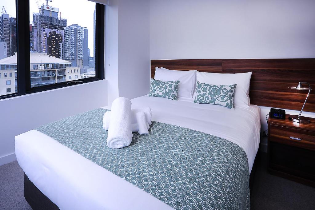 Ένα ή περισσότερα κρεβάτια σε δωμάτιο στο Flagstaff Green Apartments