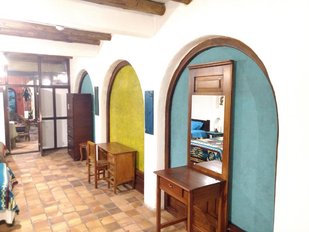 TV a/nebo společenská místnost v ubytování Aylluwasi Guesthouse