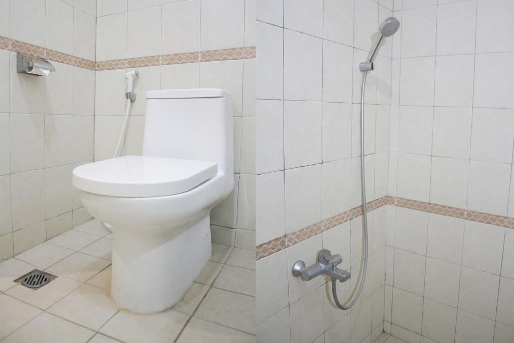 Koupelna v ubytování HOTEL & WISMA BINTANG JADAYAT