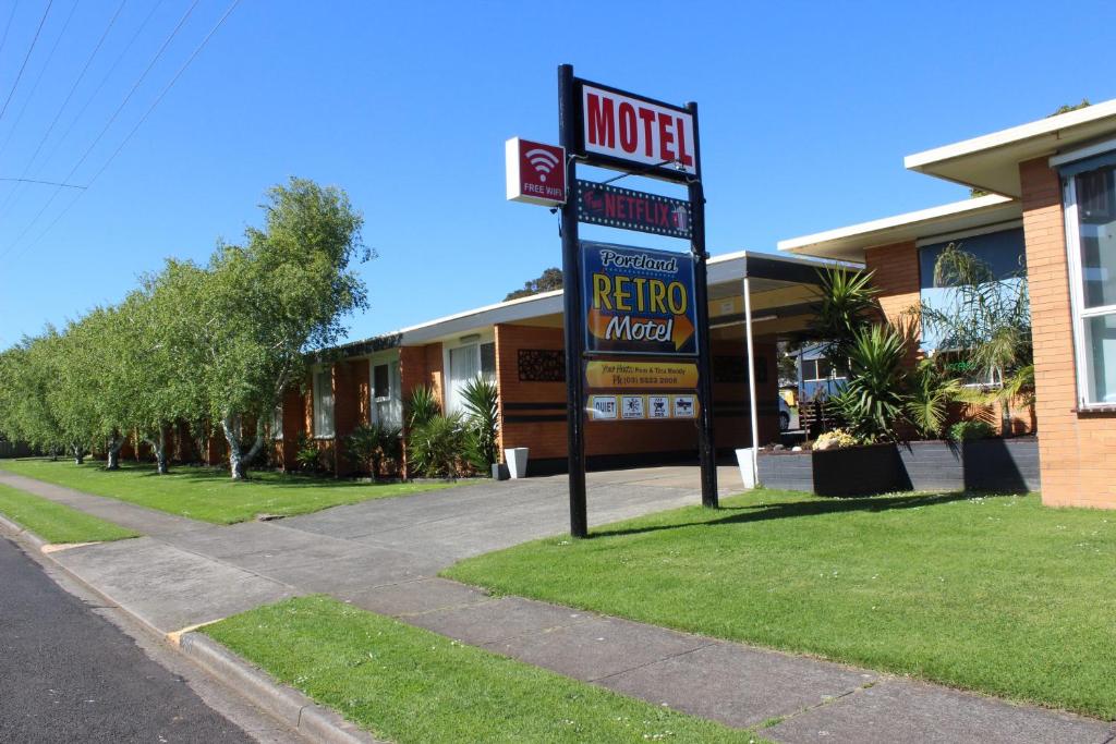a motel sign in front of a building at Portland Retro Motel in Portland