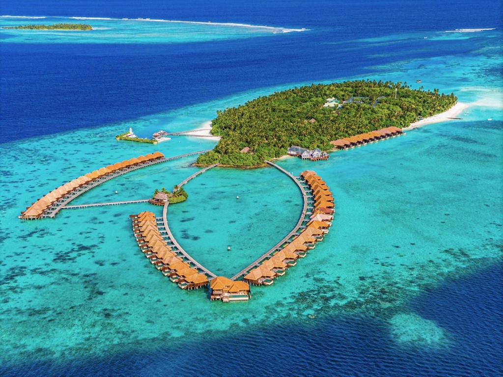 an island in the shape of a heart in the ocean at Ayada Maldives in Gaafu Dhaalu Atoll