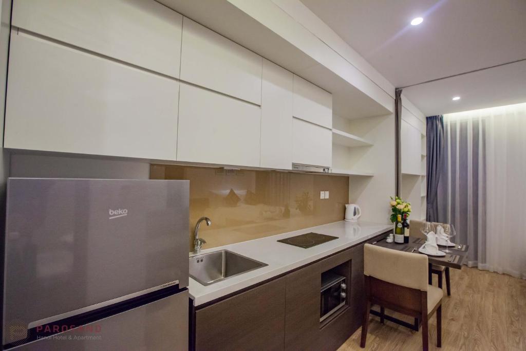 Kuchyň nebo kuchyňský kout v ubytování Parosand Hanoi Hotel