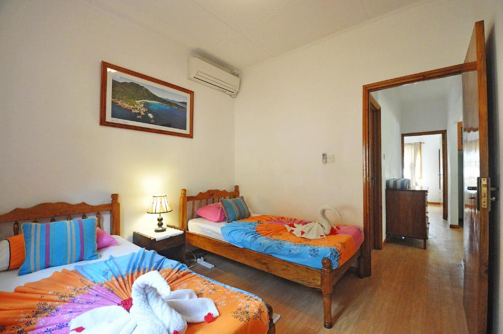 Postel nebo postele na pokoji v ubytování Acquario Guesthouse