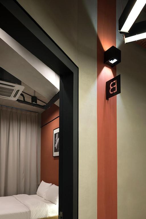 Postel nebo postele na pokoji v ubytování Tido Hostel Penang