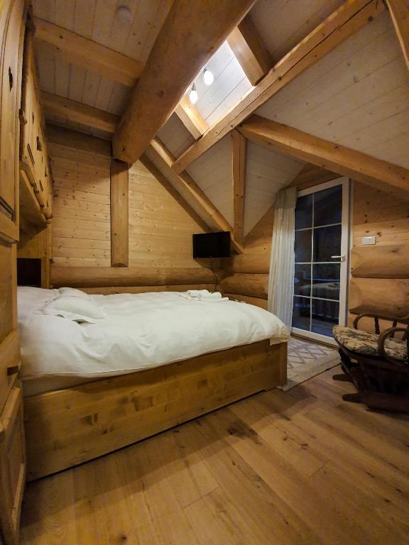 Letto o letti in una camera di Chalet le Dorf