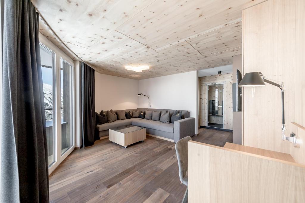 Postel nebo postele na pokoji v ubytování Hotel Angerer Alm