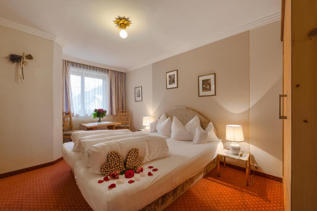 Postel nebo postele na pokoji v ubytování Hotel Ehrenreich