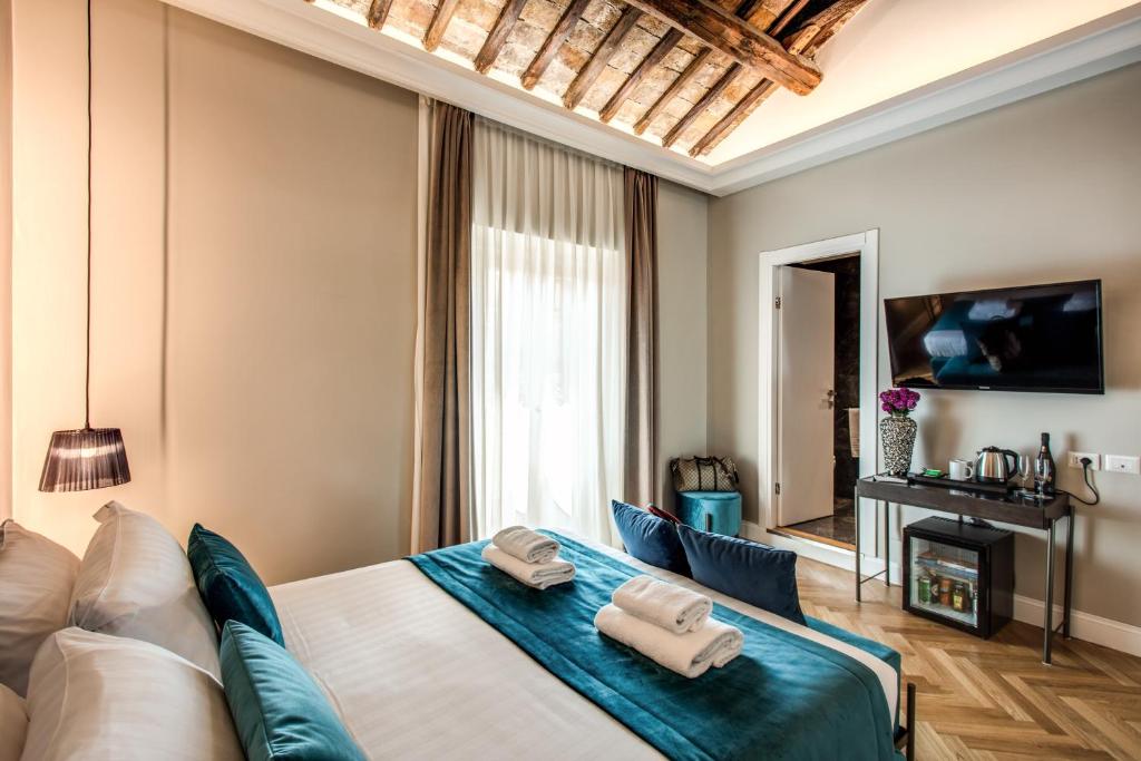 TV a/nebo společenská místnost v ubytování Hotel 55 Fifty-Five - Maison d'Art Collection