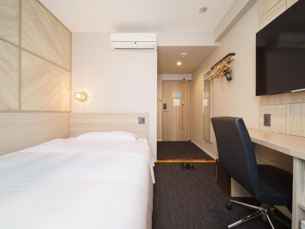 TV a/nebo společenská místnost v ubytování Super Hotel Umeda Higobashi