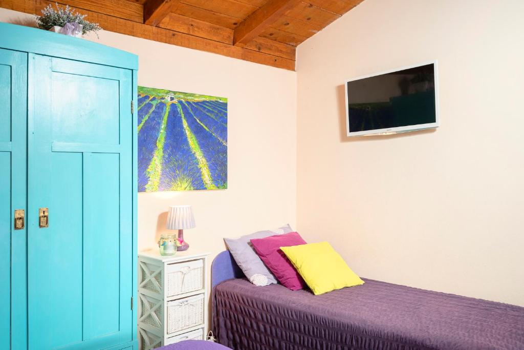 Televízia a/alebo spoločenská miestnosť v ubytovaní Villa Oxa Dreamland
