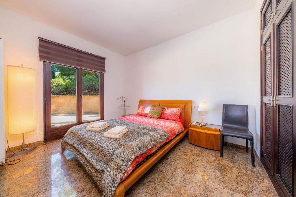 Postel nebo postele na pokoji v ubytování Casa Kyona