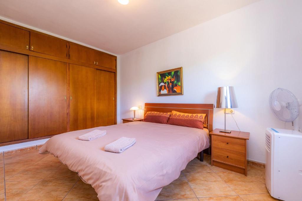 Postel nebo postele na pokoji v ubytování Casa Kyona