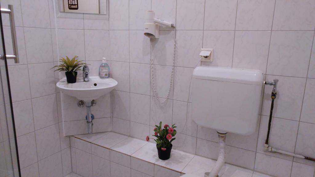 Koupelna v ubytování Hotel M68