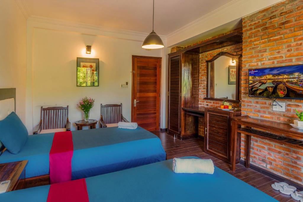 Zona d'estar a Calm House Hotel Hoi An 1