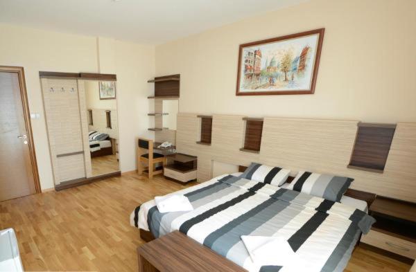 Postel nebo postele na pokoji v ubytování Hotel Bella Nella