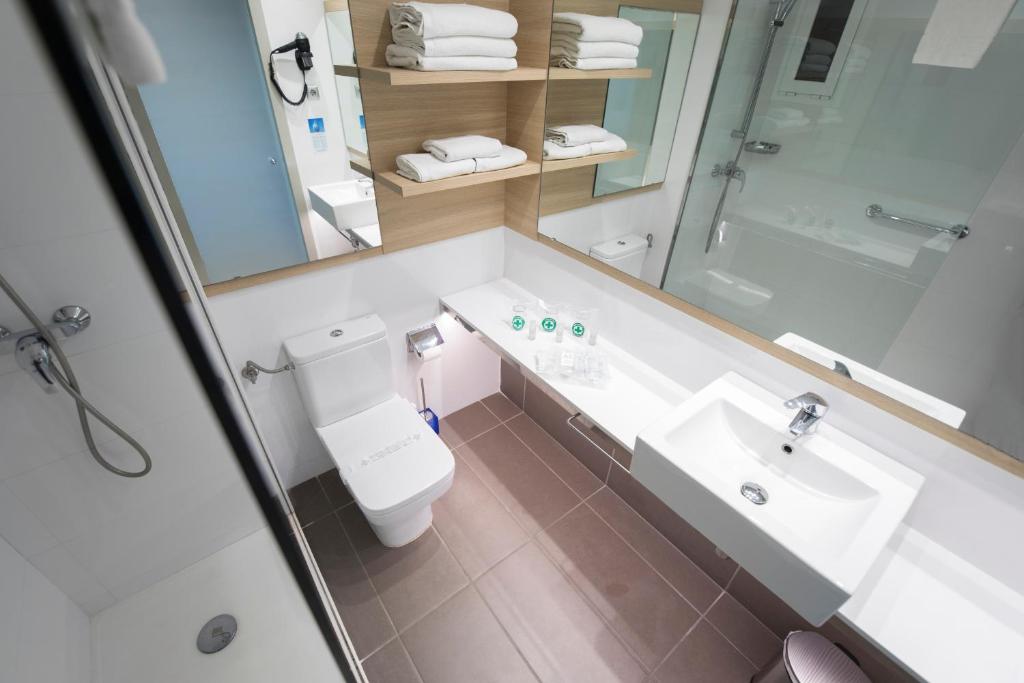 Kúpeľňa v ubytovaní Hotel Cesar Augustus