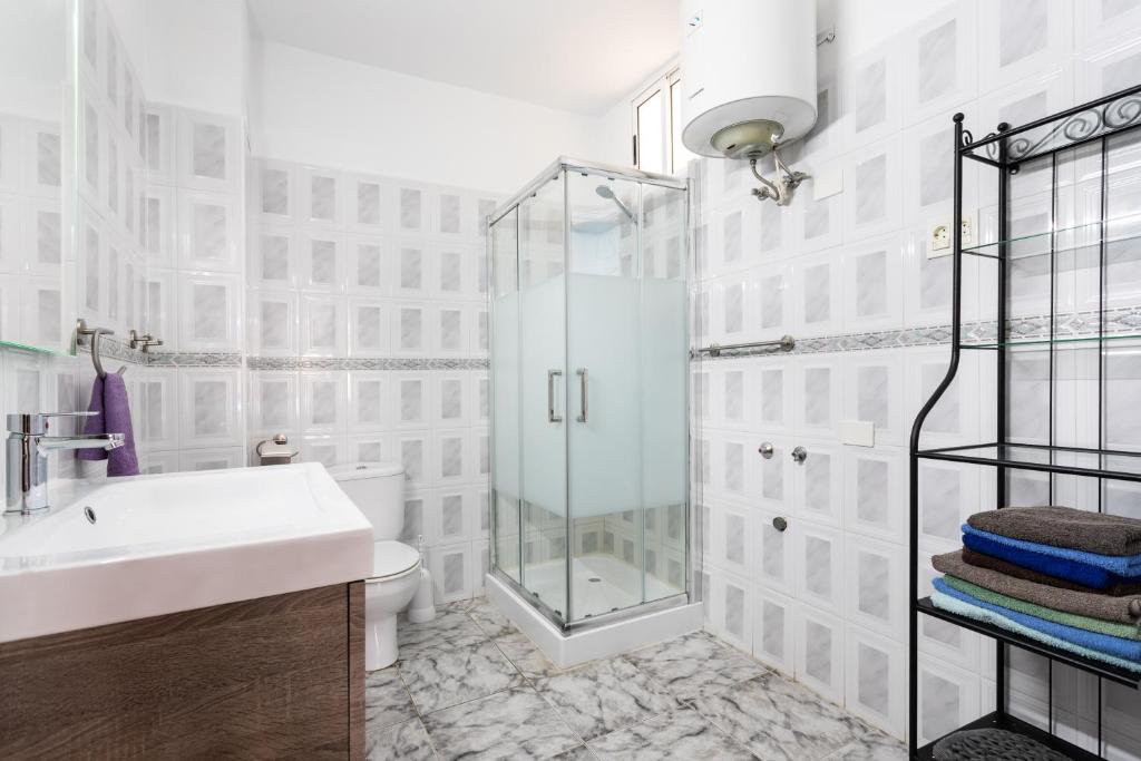 a bathroom with a sink and a shower at Casa Alcala in Alcalá