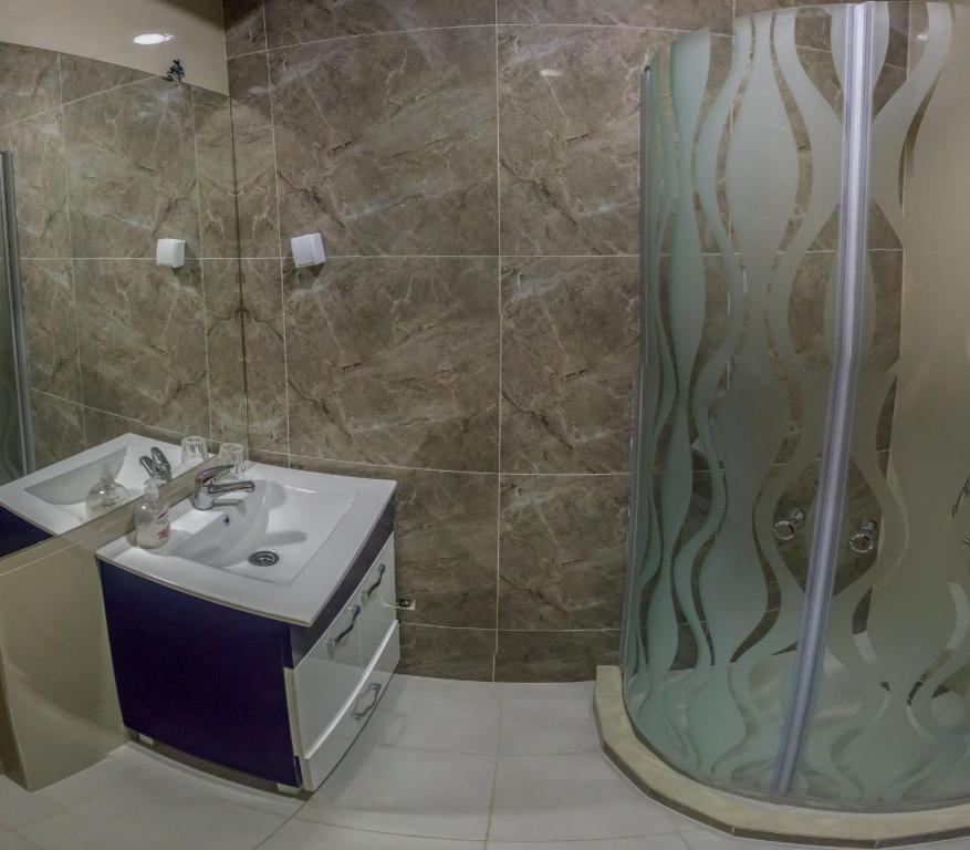 Koupelna v ubytování Hotel Bella Nella