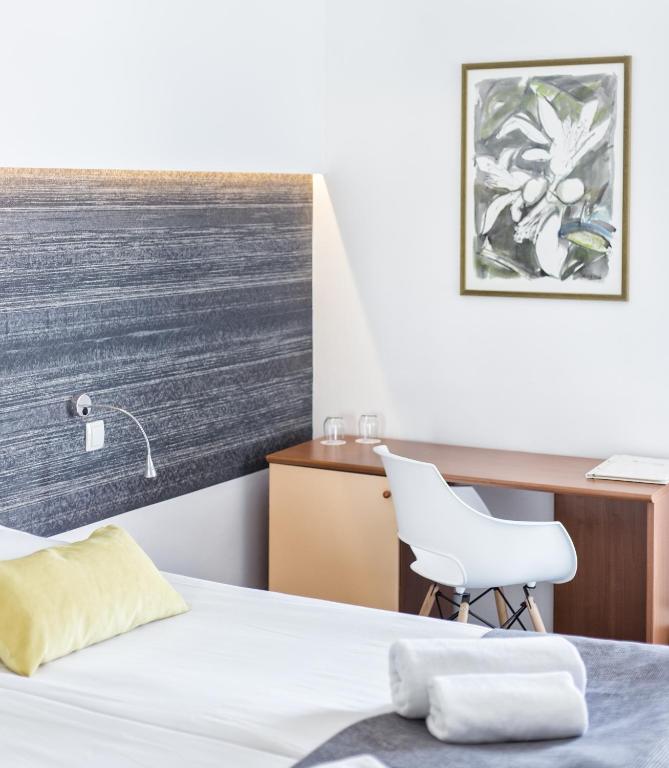 Posteľ alebo postele v izbe v ubytovaní Hotel Punta