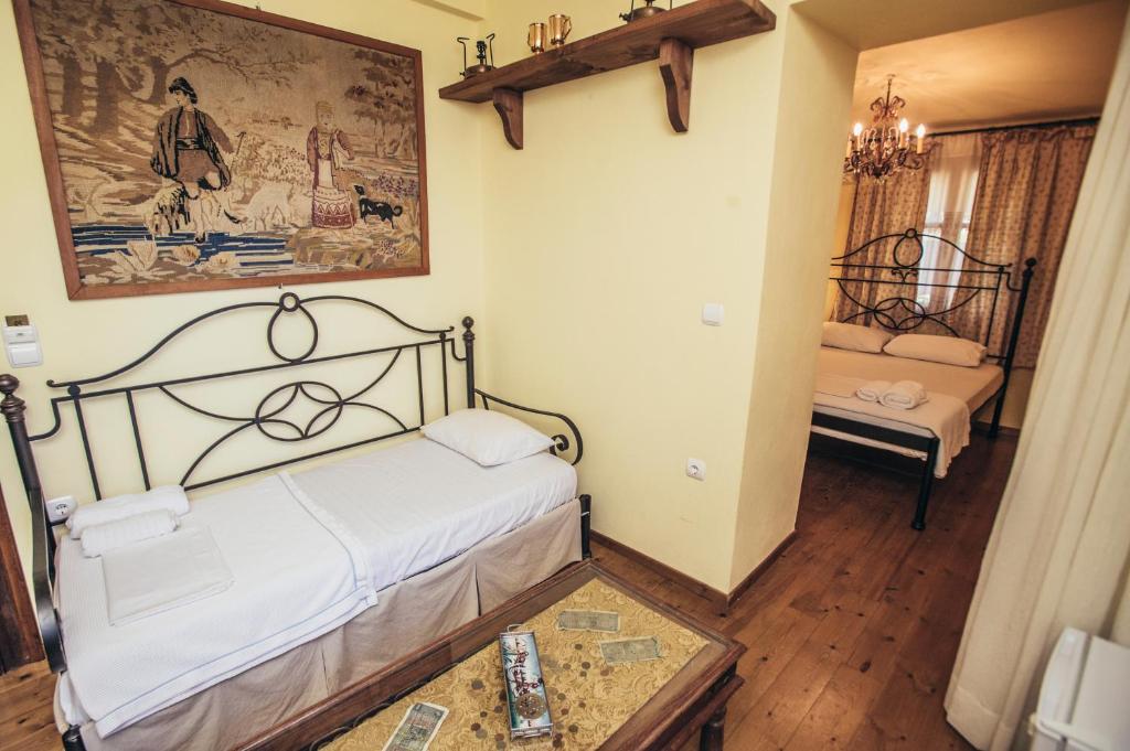 Postel nebo postele na pokoji v ubytování Ellis Full Guest House