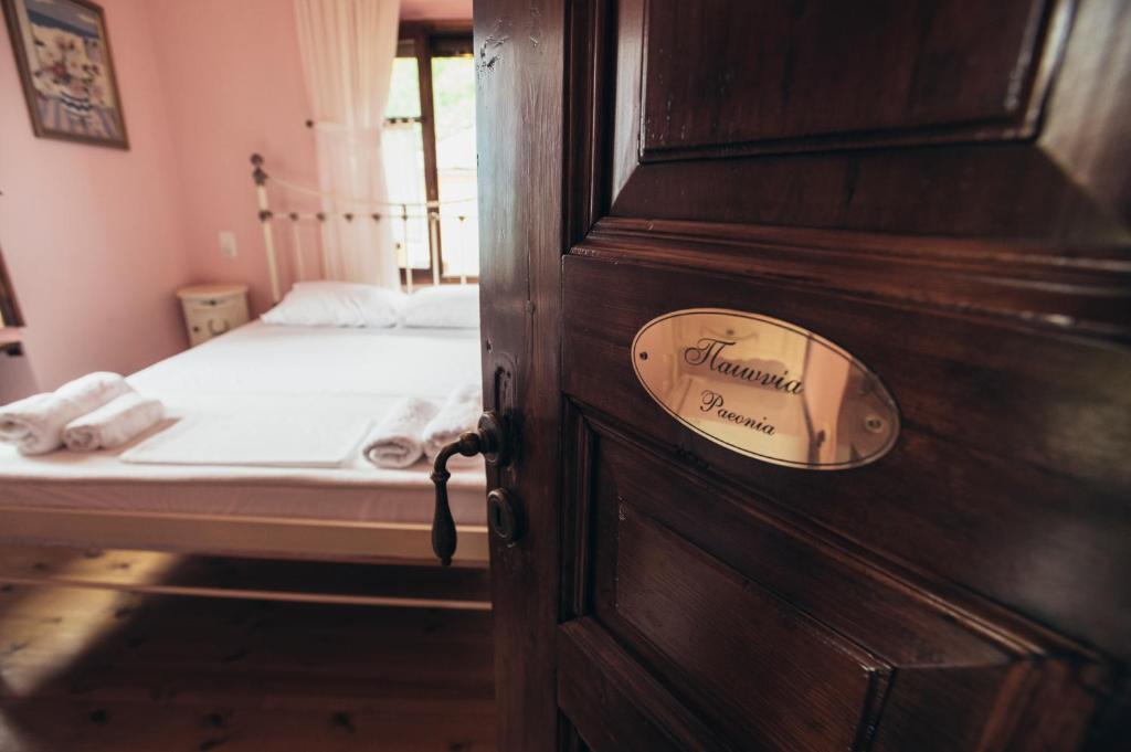 Postel nebo postele na pokoji v ubytování Ellis Full Guest House