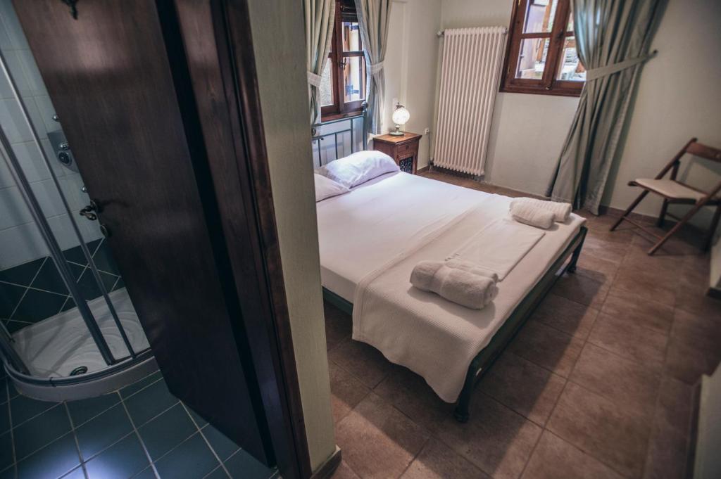 Postel nebo postele na pokoji v ubytování Ellis Full Guest House