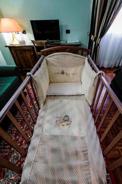 Posteľ alebo postele v izbe v ubytovaní Hotel Lucrezia Borgia