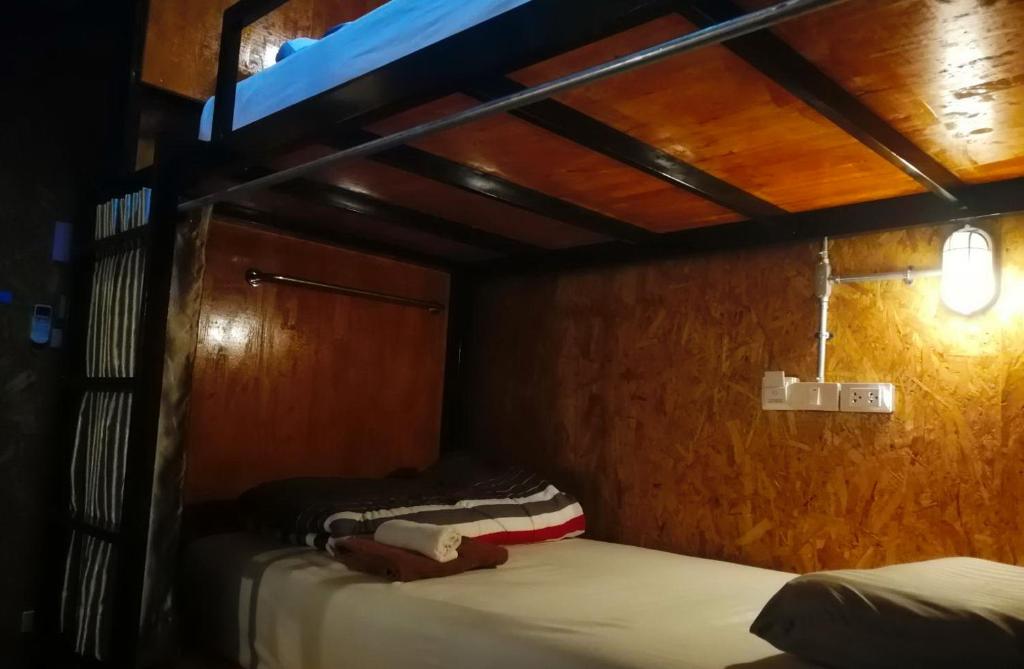 Postel nebo postele na pokoji v ubytování Aenguy Hostel