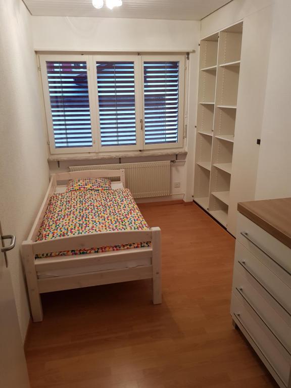 Een bed of bedden in een kamer bij Gästehaus Luma