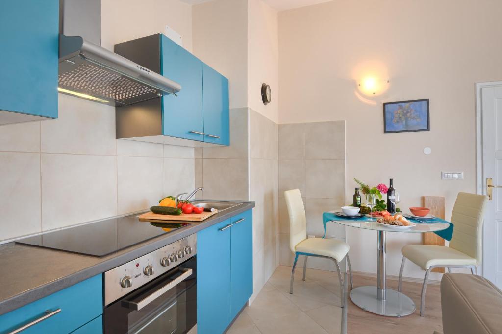 Kuchnia lub aneks kuchenny w obiekcie Villa Hope Apartments