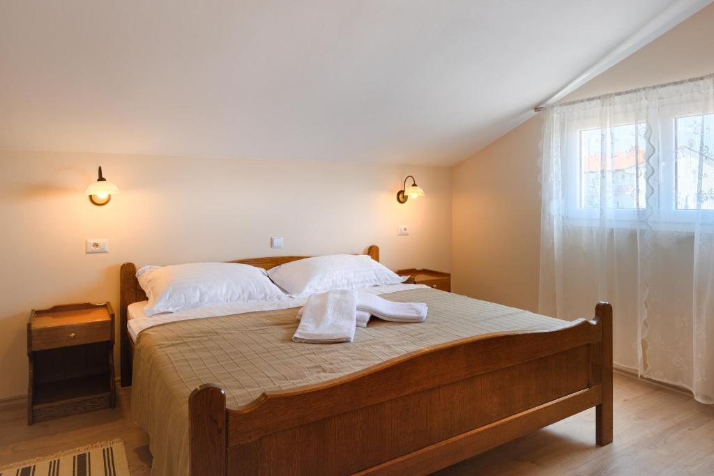 Łóżko lub łóżka w pokoju w obiekcie Villa Hope Apartments