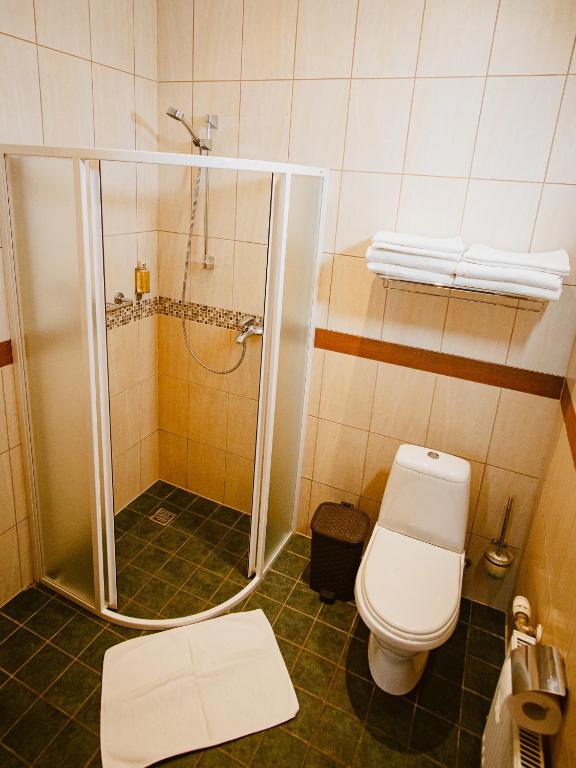 Koupelna v ubytování Kaķītis hotel & spa