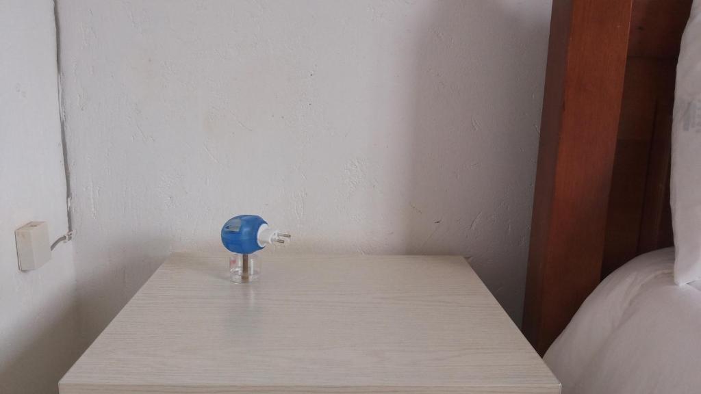 Postel nebo postele na pokoji v ubytování St Lira Hotel