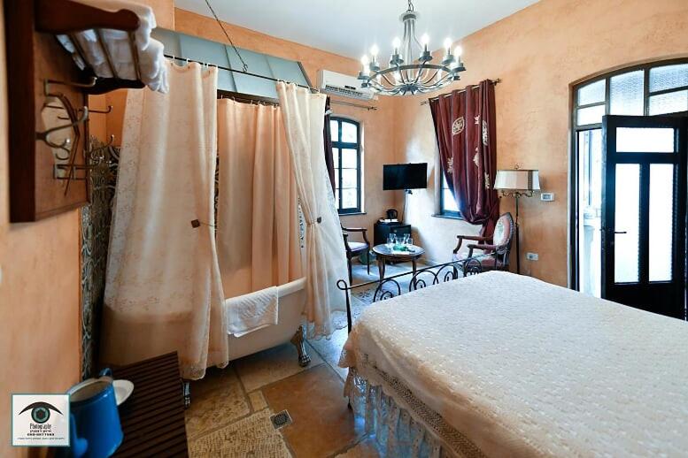 Postel nebo postele na pokoji v ubytování Atelier Luxury Rooms
