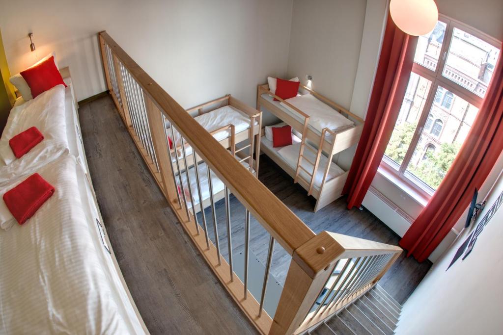 Postel nebo postele na pokoji v ubytování MEININGER Hotel Berlin Mitte