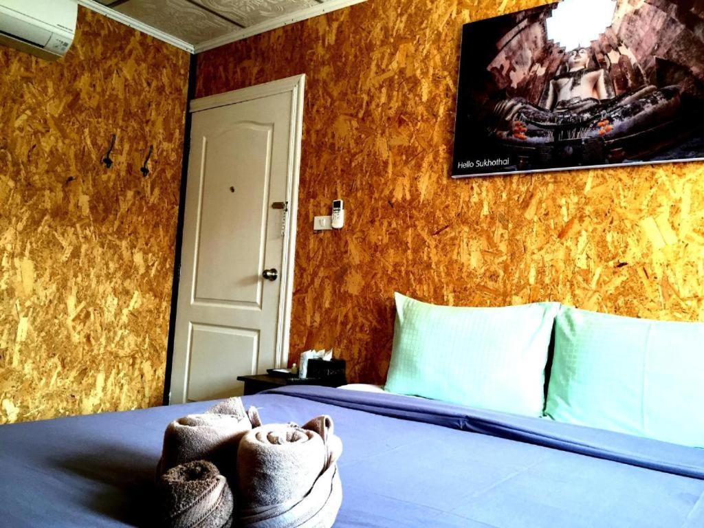 Postel nebo postele na pokoji v ubytování Aenguy Hostel