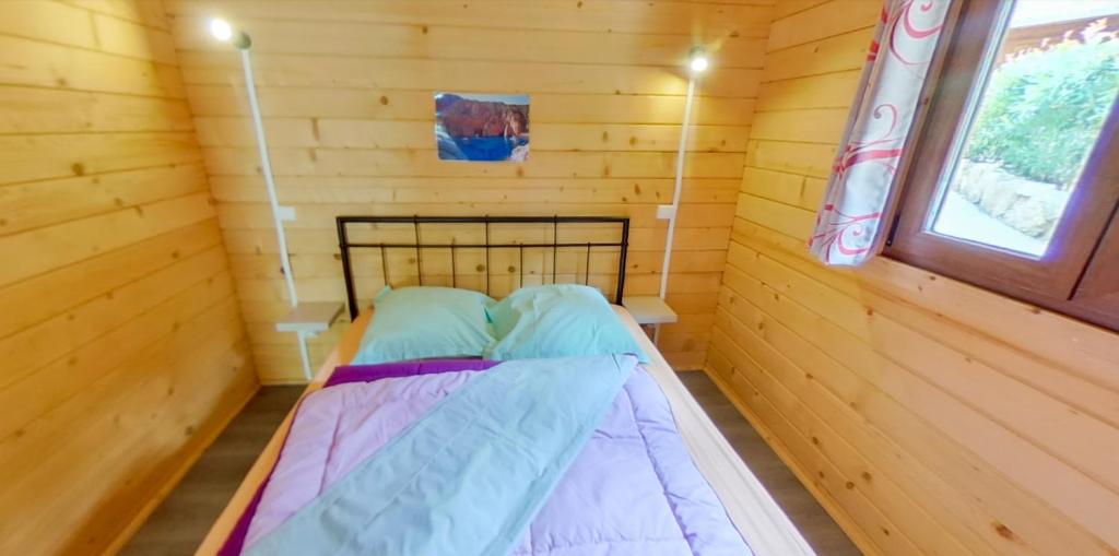 Postel nebo postele na pokoji v ubytování Funtana a l'Ora