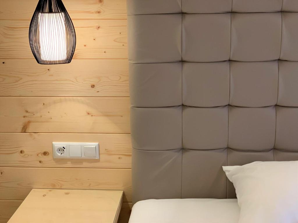 Postel nebo postele na pokoji v ubytování Hotel San Marco