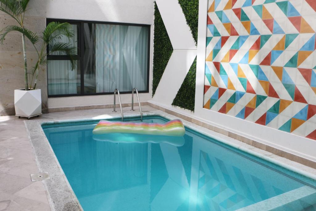 Bazén v ubytování FCH Hotel Providencia nebo v jeho okolí