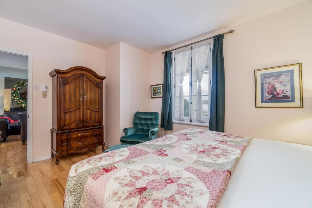 Postel nebo postele na pokoji v ubytování Goéliche hotel et appartement