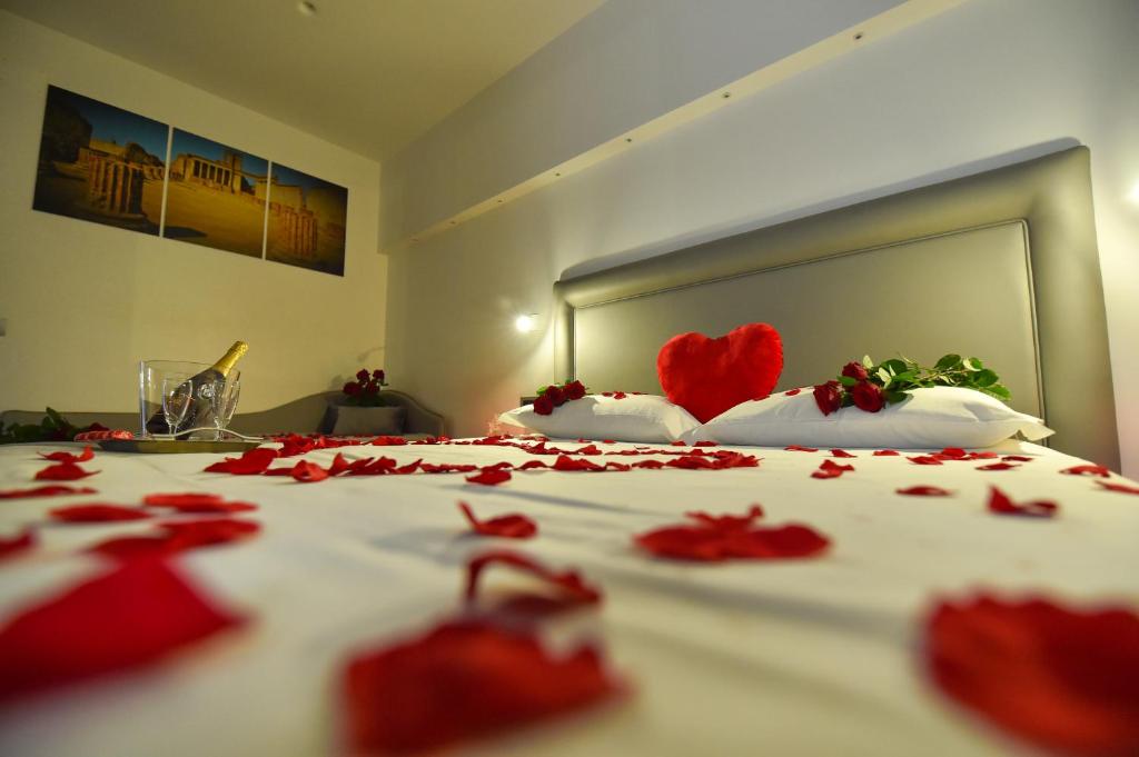 Posteľ alebo postele v izbe v ubytovaní Pompei Inn Ruins B&B Luxury Suite