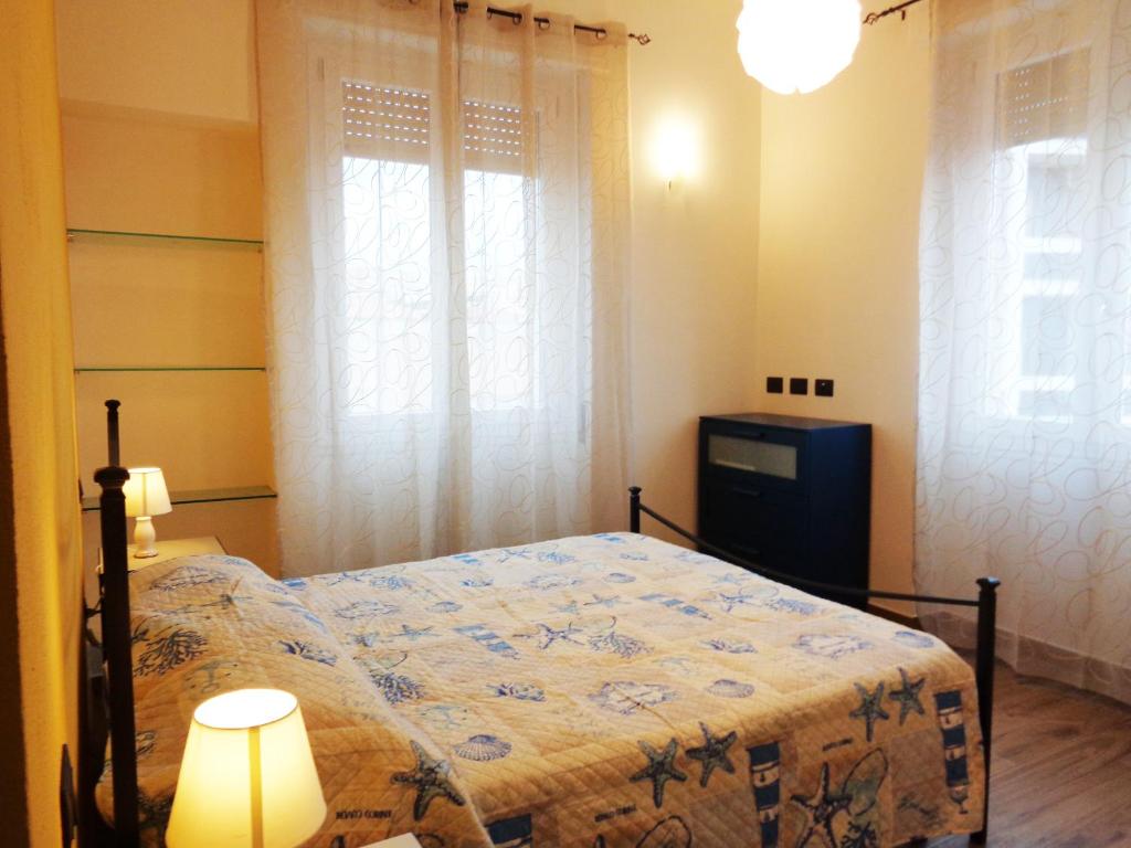 Gulta vai gultas numurā naktsmītnē Wonderful apartment in Cagliari center