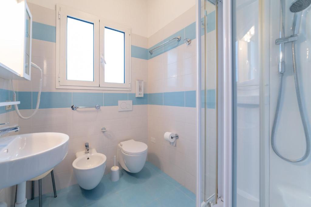 Koupelna v ubytování Hotel Mimosa