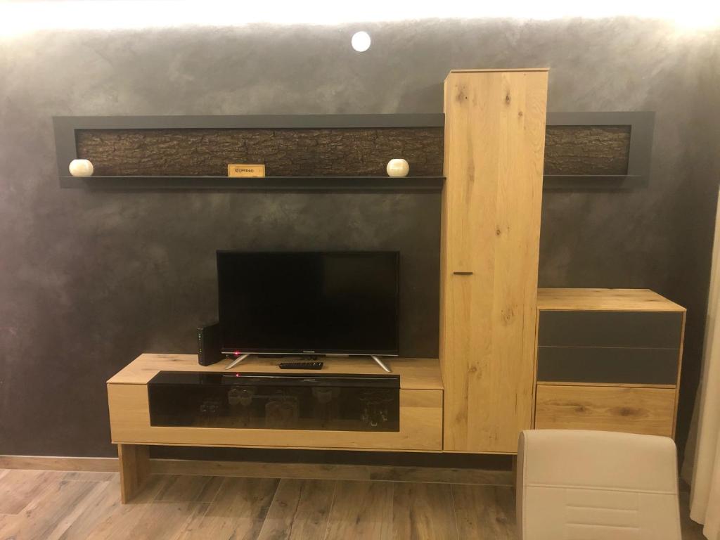 Televízia a/alebo spoločenská miestnosť v ubytovaní Casa Alpina Relax - Pool&Sauna - include Jokercard