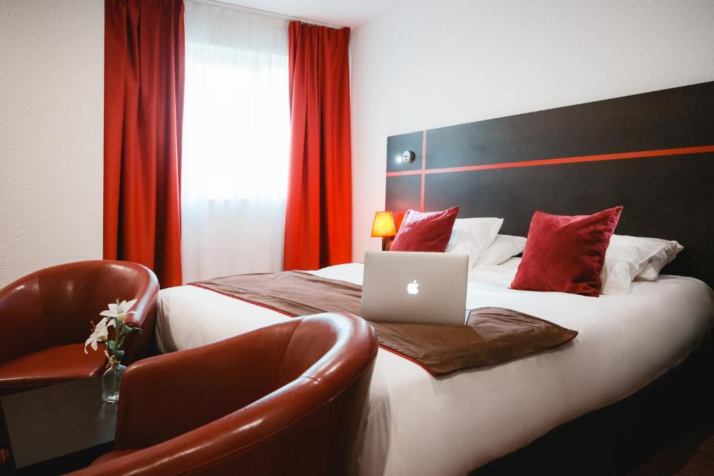 Postel nebo postele na pokoji v ubytování Zenia Hotel & Spa
