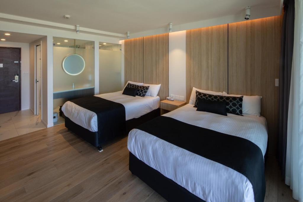 Letto o letti in una camera di Ocean Front Motel
